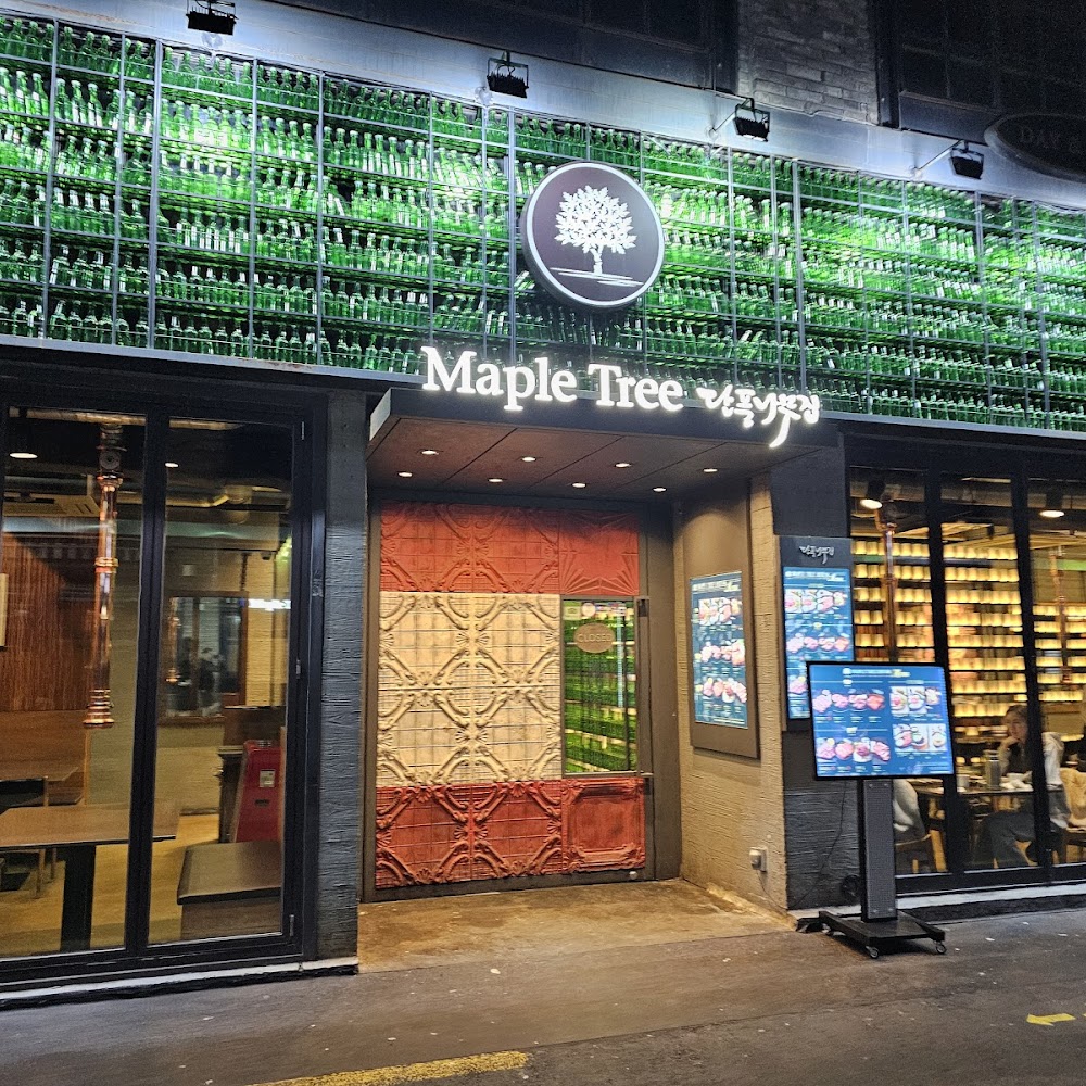 Korean BBQ (Galbi/Bulgogi) — must-try food in Seoul at Maple Tree House (Hongdae) or local BBQ joints